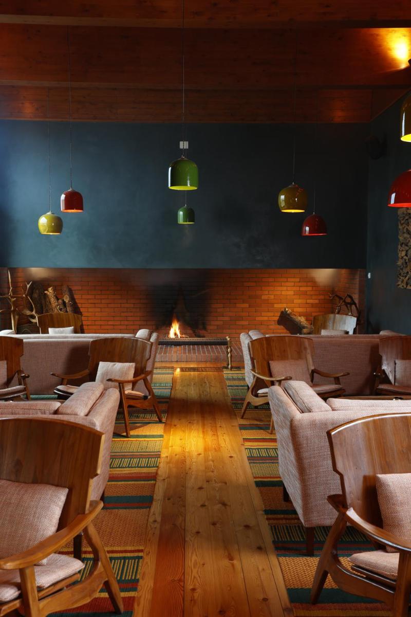 Uma área de estar em Praia do Canal Nature Retreat - Small Luxury Hotels of the World