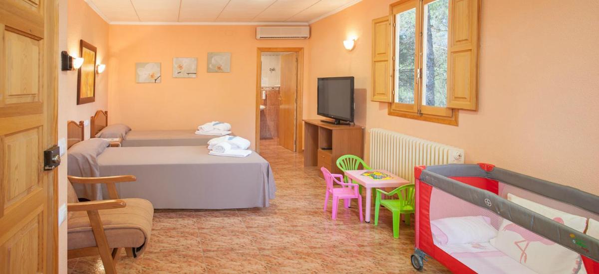 Cama o camas de una habitación en Balneario de Cofrentes