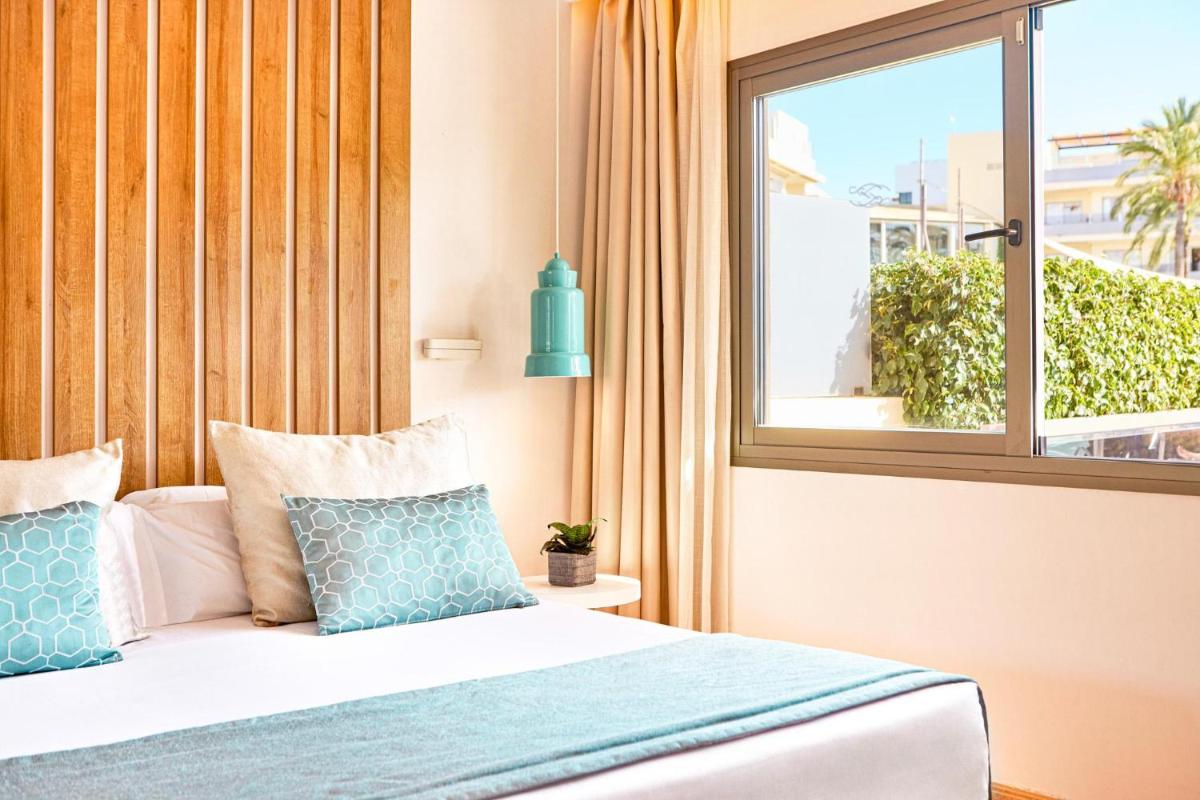 Cama o camas de una habitación en Zafiro Palmanova
