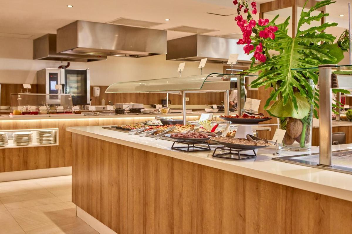 Una cocina o zona de cocina en Zafiro Palmanova