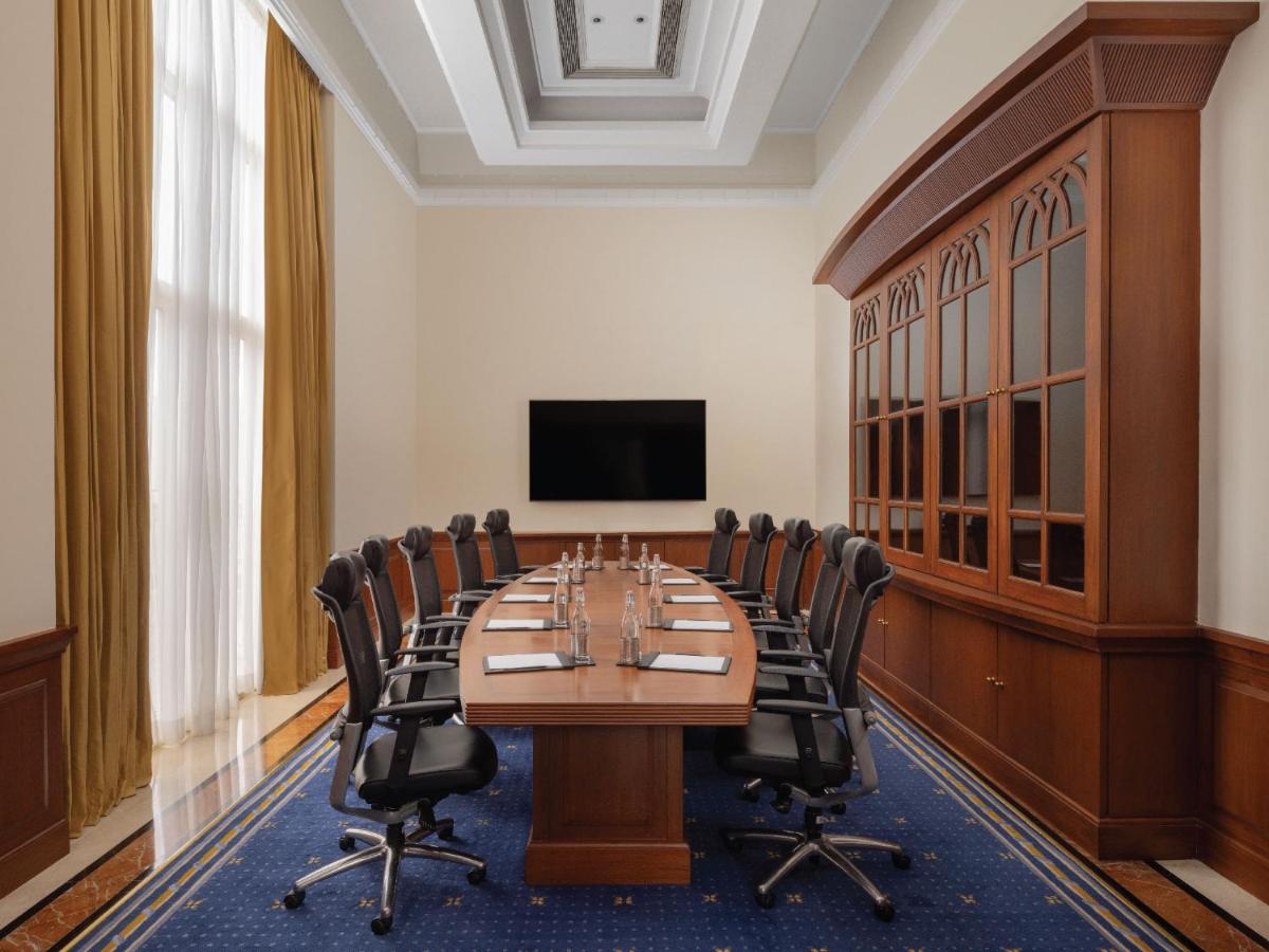 a conference room with a long table and chairs at ITC Grand Central, a Luxury Collection Hotel, Mumbai in Mumbai