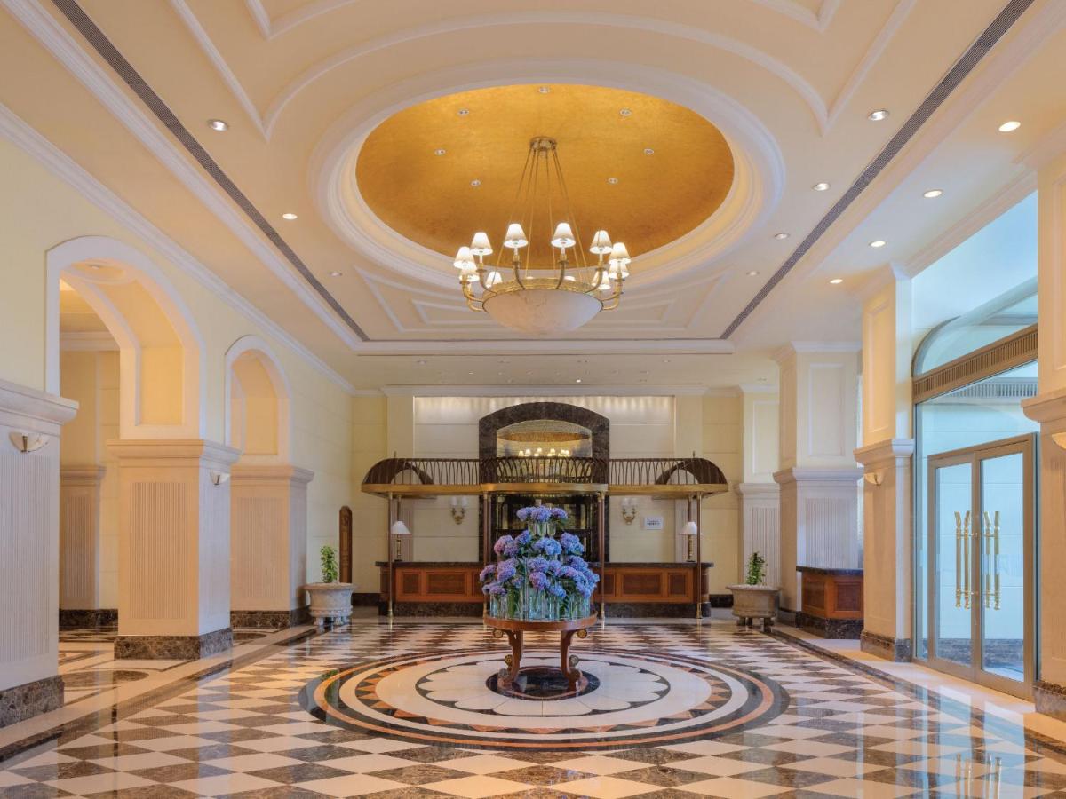 a lobby with a vase of flowers on the floor at ITC Grand Central, a Luxury Collection Hotel, Mumbai in Mumbai