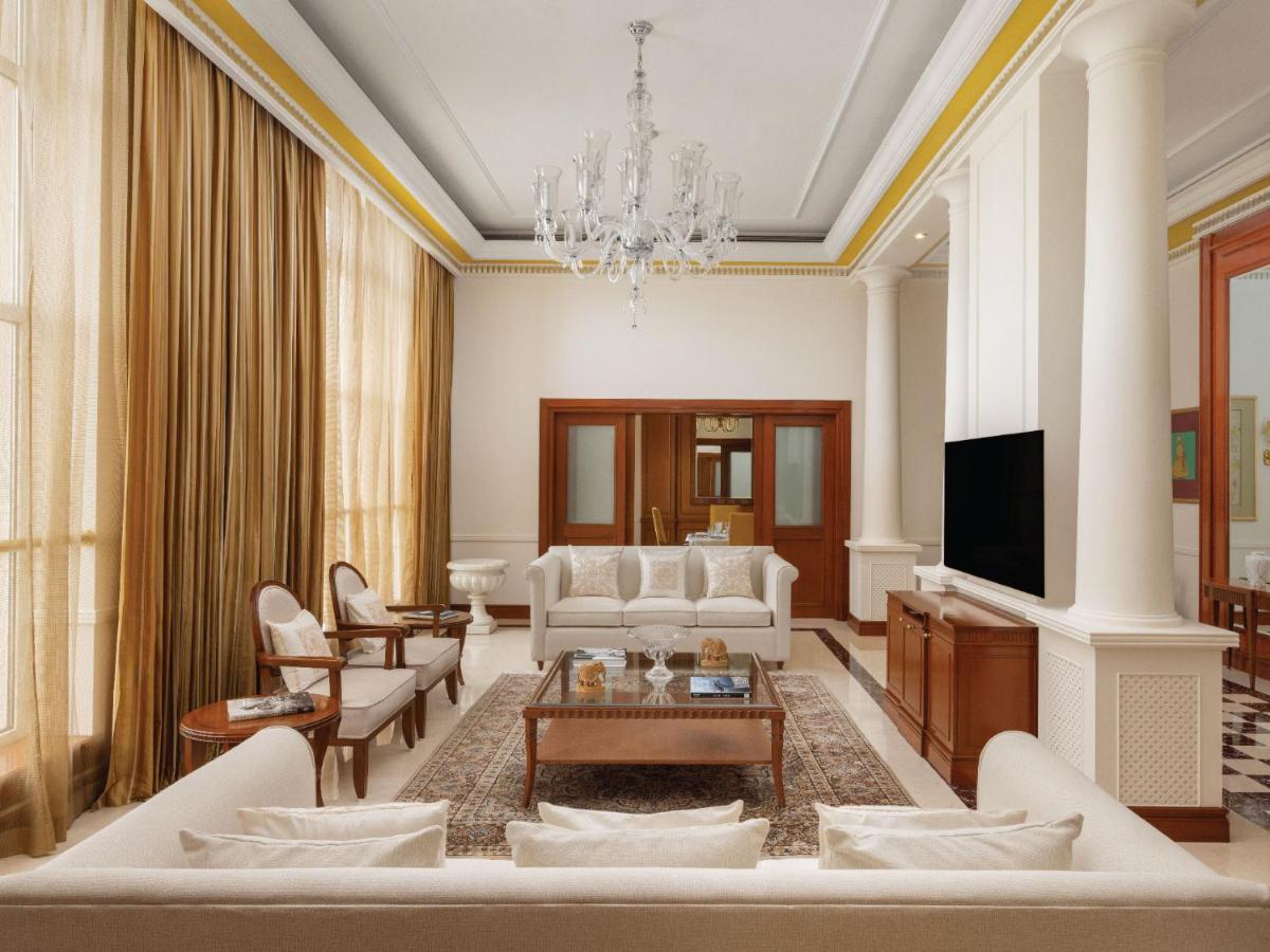 a living room with a couch and a tv at ITC Grand Central, a Luxury Collection Hotel, Mumbai in Mumbai