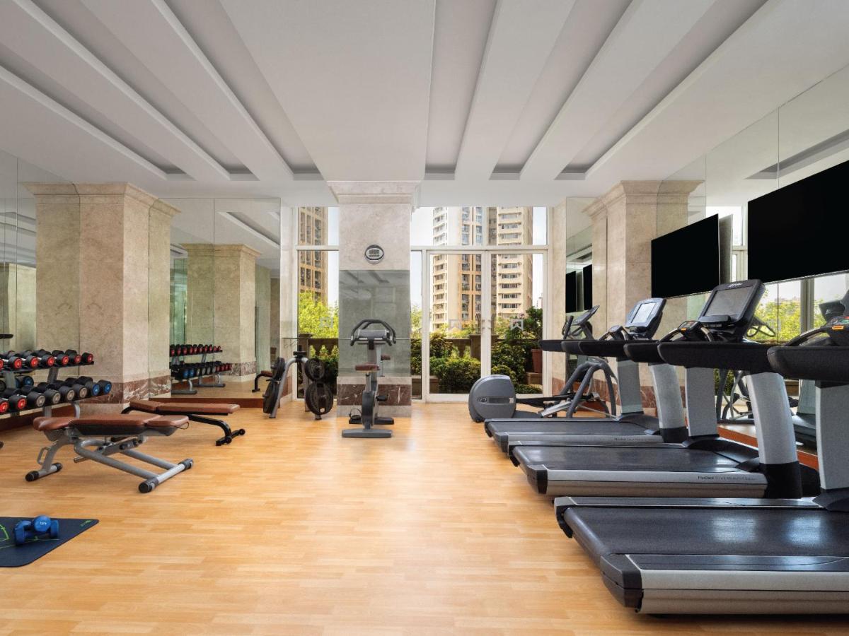 a gym with treadmills and exercise equipment in a building at ITC Grand Central, a Luxury Collection Hotel, Mumbai in Mumbai