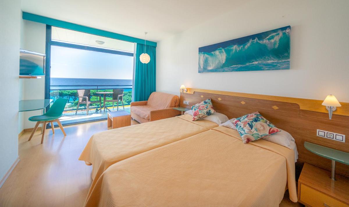 Cama o camas de una habitación en Hotel Blaucel