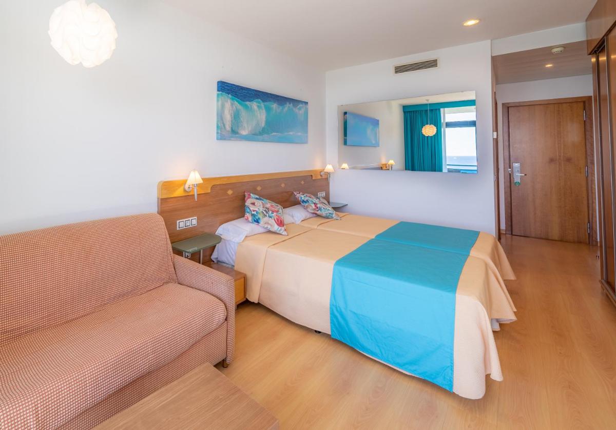 Cama o camas de una habitación en Hotel Blaucel