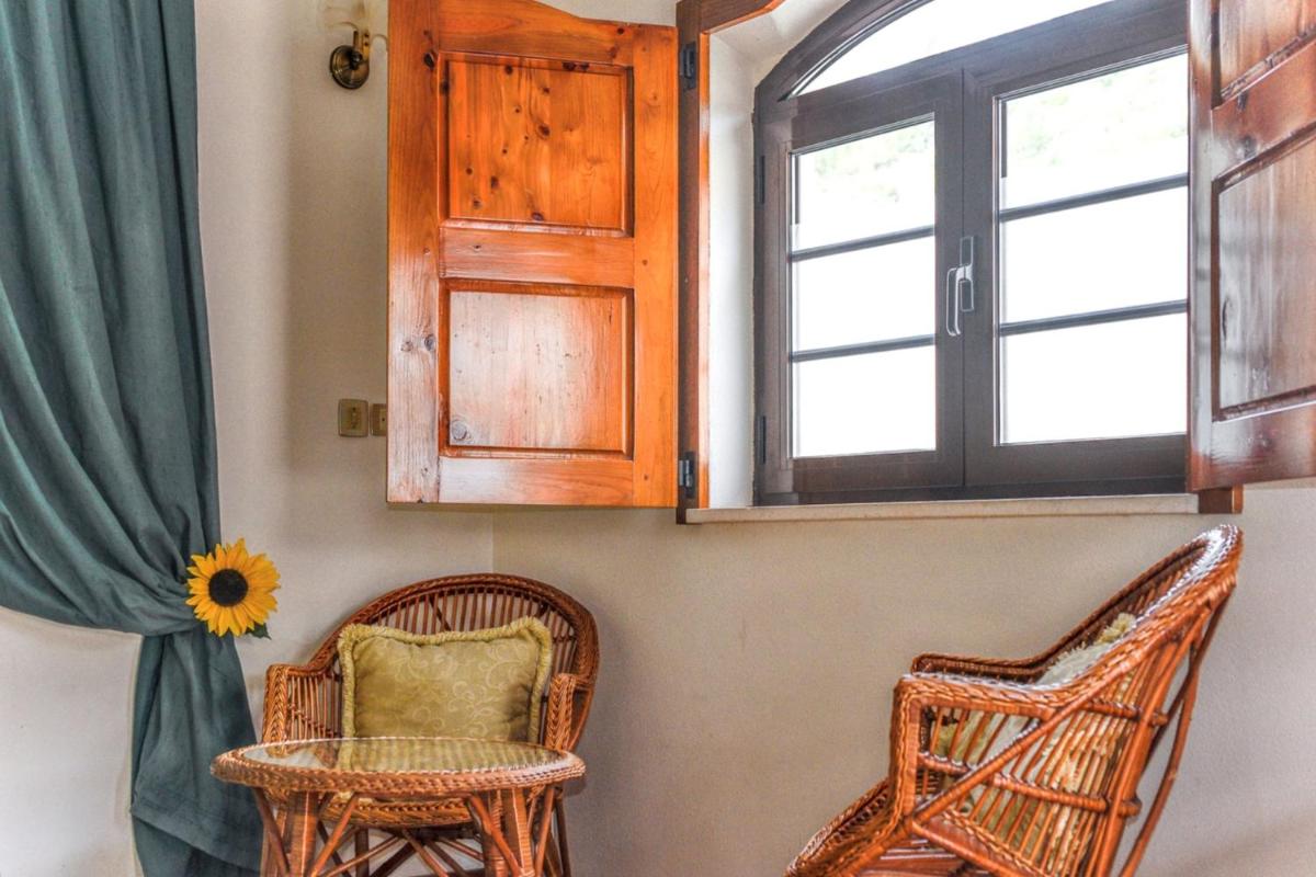 Comfortable house in Porto de Mos 45 m² with shared pool - Housity