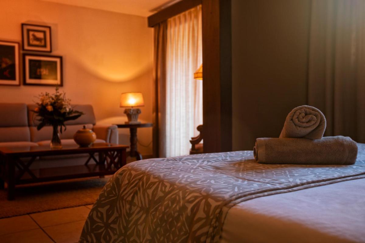 Cama o camas de una habitación en SWISS MORAIRA HOTEL & SPA - Adults only