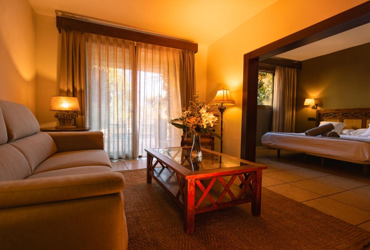 Cama o camas de una habitación en SWISS MORAIRA HOTEL & SPA - Adults only