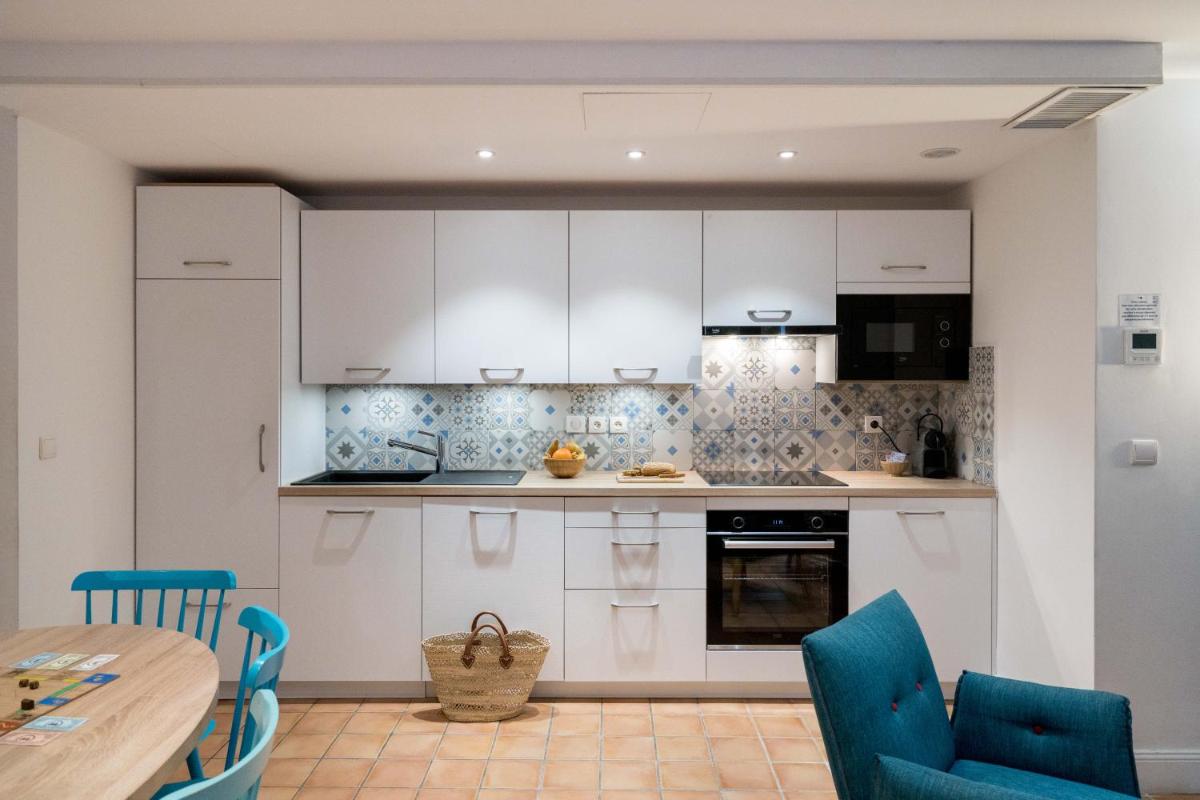 Cuisine ou kitchenette dans l'établissement La Résidence du Bailli