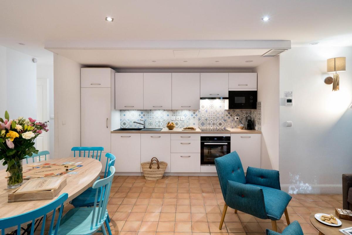 Cuisine ou kitchenette dans l'établissement La Résidence du Bailli