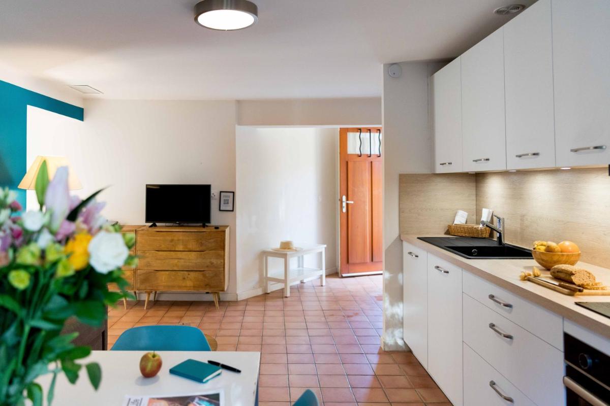 Cuisine ou kitchenette dans l'établissement La Résidence du Bailli