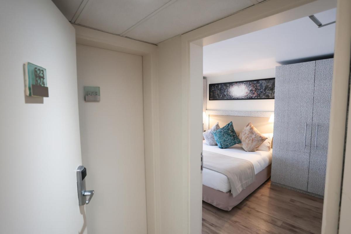 Un ou plusieurs lits dans un hébergement de l'établissement Eden Hotel & Spa