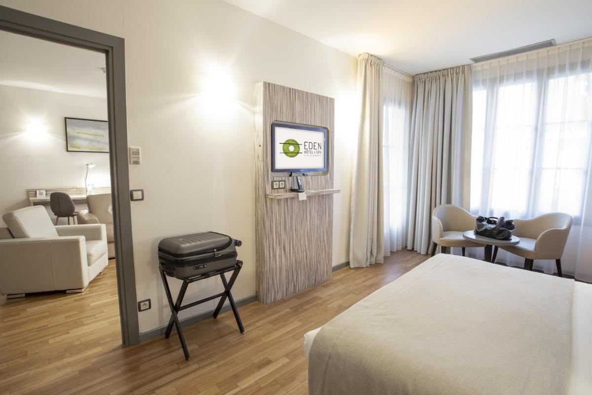 Un ou plusieurs lits dans un hébergement de l'établissement Eden Hotel & Spa