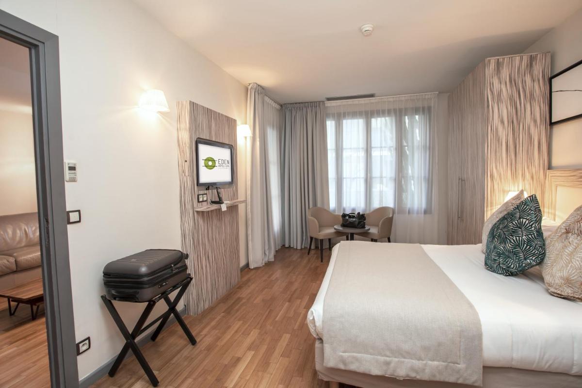 Un ou plusieurs lits dans un hébergement de l'établissement Eden Hotel & Spa