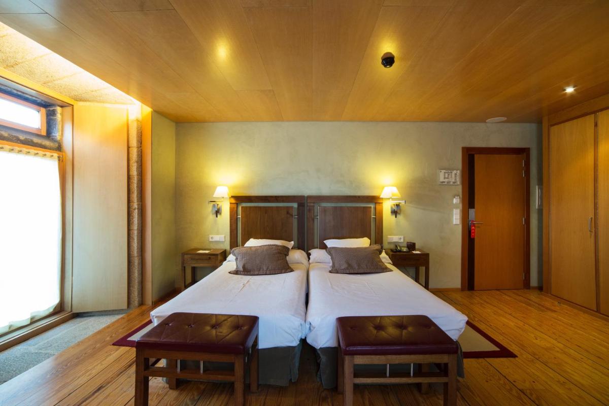 Cama o camas de una habitación en Parador de Santo Estevo