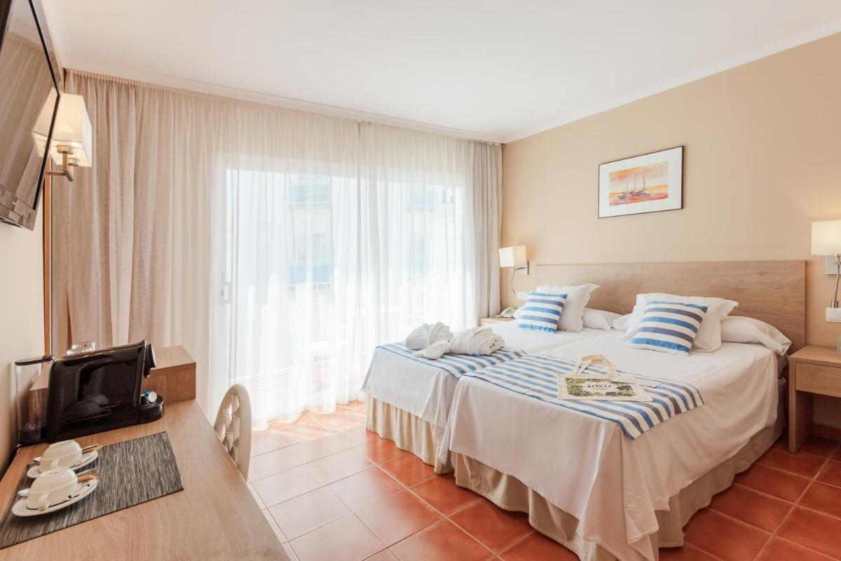 Cama o camas de una habitación en DWO Les Palmeres