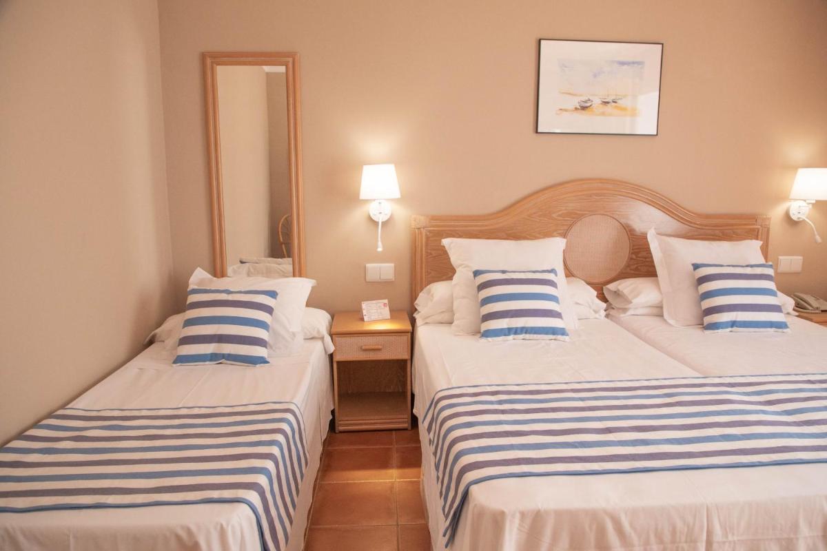 Cama o camas de una habitación en DWO Les Palmeres