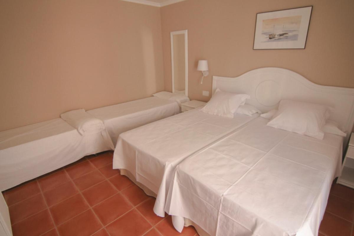 Cama o camas de una habitación en DWO Les Palmeres