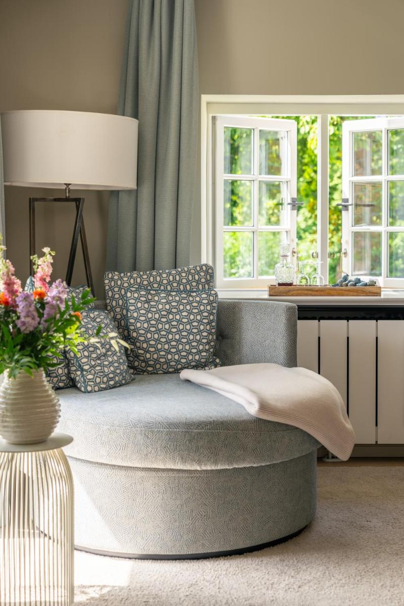 Ein Bett oder Betten in einem Zimmer der Unterkunft Weissenhaus Private Nature Luxury Resort