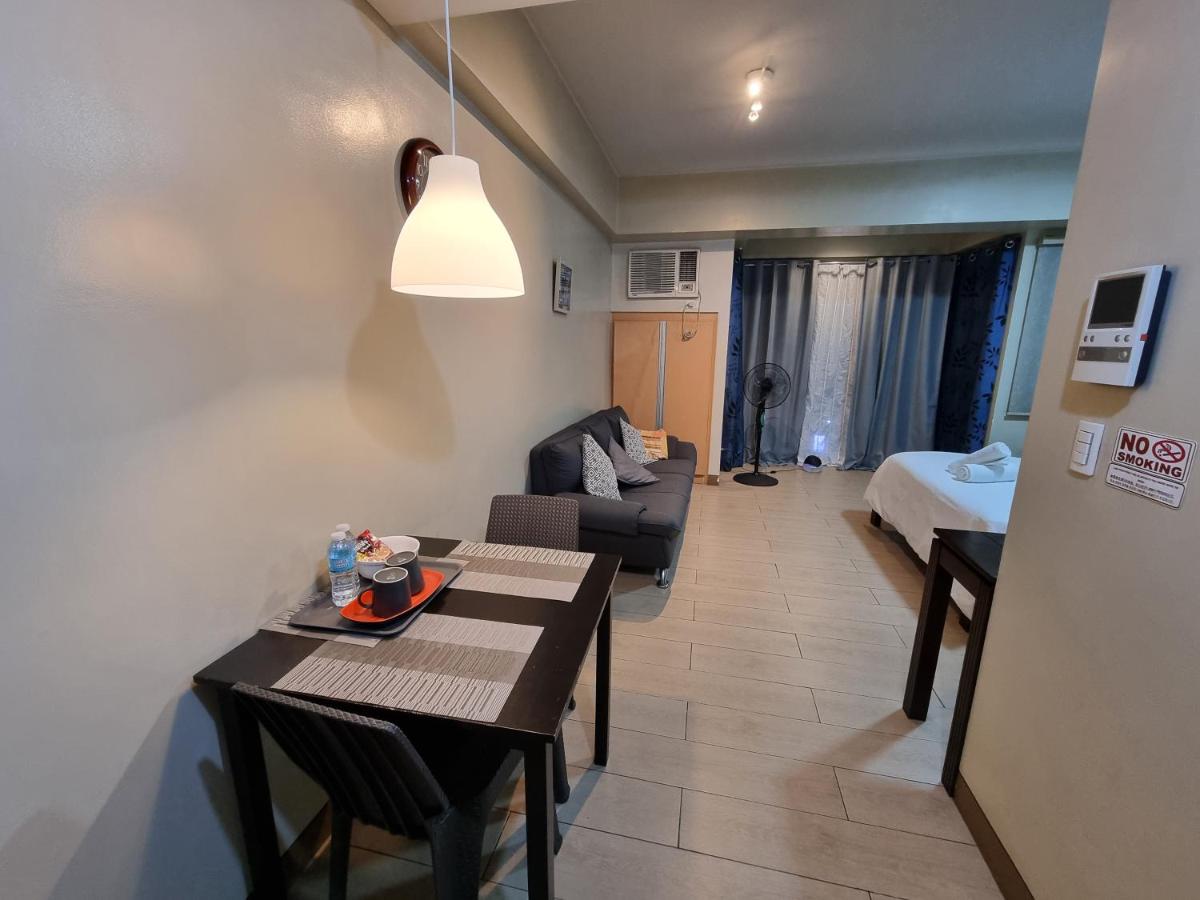 Palm Tree Condos near MNL Airport Terminal 3 by ELR - Housity