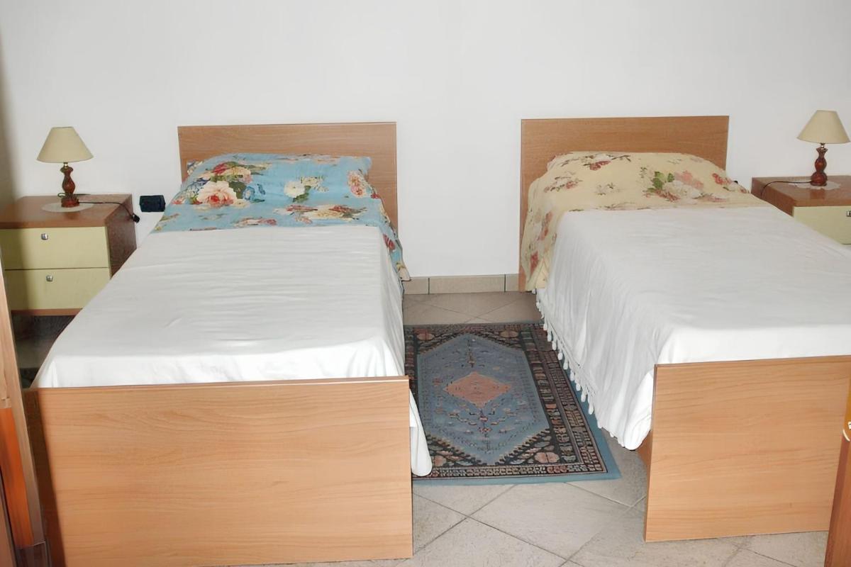 Charming apartment in Nughedu Santa Vittoria - 90 m² with fireplace - Housity