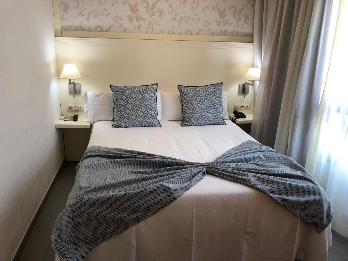 Cama o camas de una habitación en Hotel Spa Cap de Creus