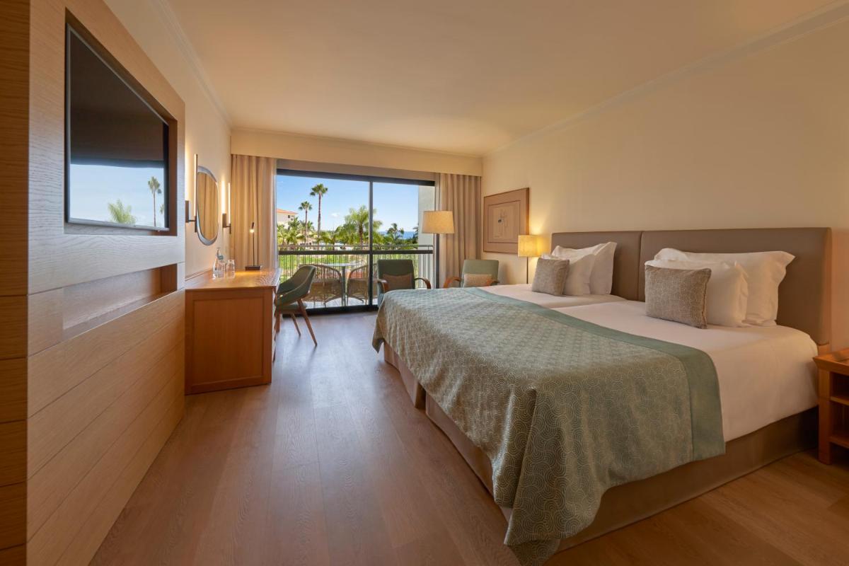 Uma cama ou camas num quarto em Hotel Porto Mare - PortoBay