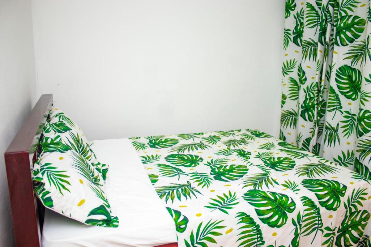 NAIVELI-PALM Appartement meublé sobre et chic - Housity