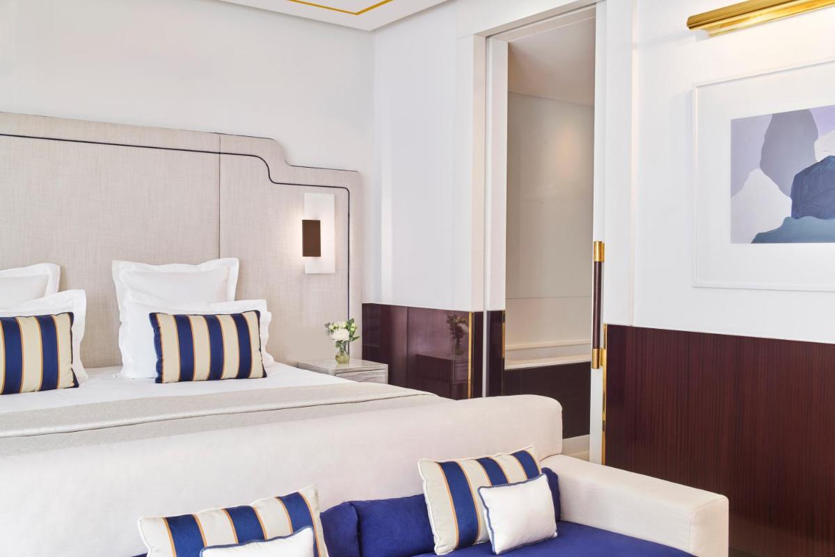 Un ou plusieurs lits dans un hébergement de l'établissement Hôtel Barrière Le Majestic Cannes