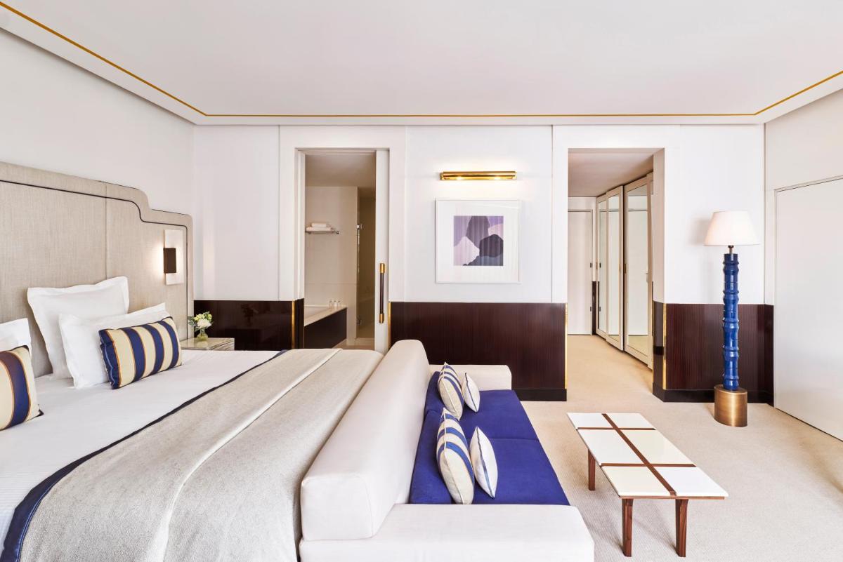 Un ou plusieurs lits dans un hébergement de l'établissement Hôtel Barrière Le Majestic Cannes
