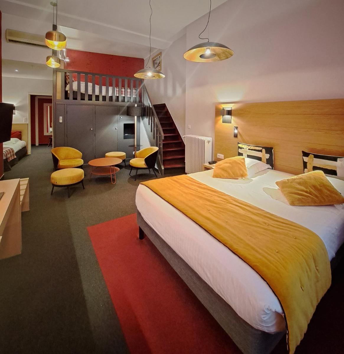 Un ou plusieurs lits dans un hébergement de l'établissement Hôtel des Princes, Chambéry Centre