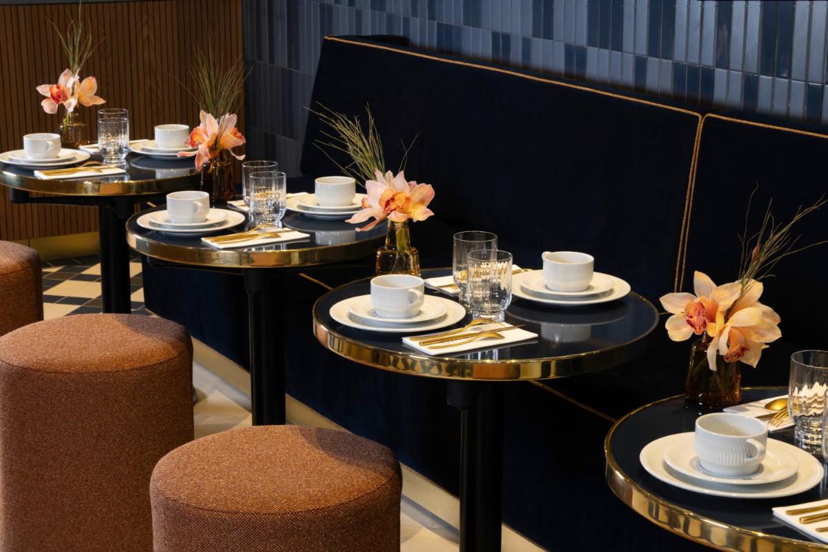Restaurant ou autre lieu de restauration dans l'établissement Hôtel Filigrane & Spa