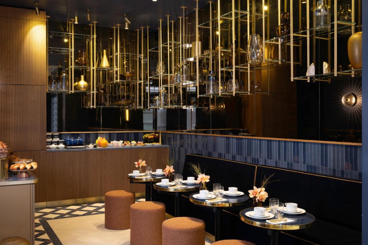 Restaurant ou autre lieu de restauration dans l'établissement Hôtel Filigrane & Spa