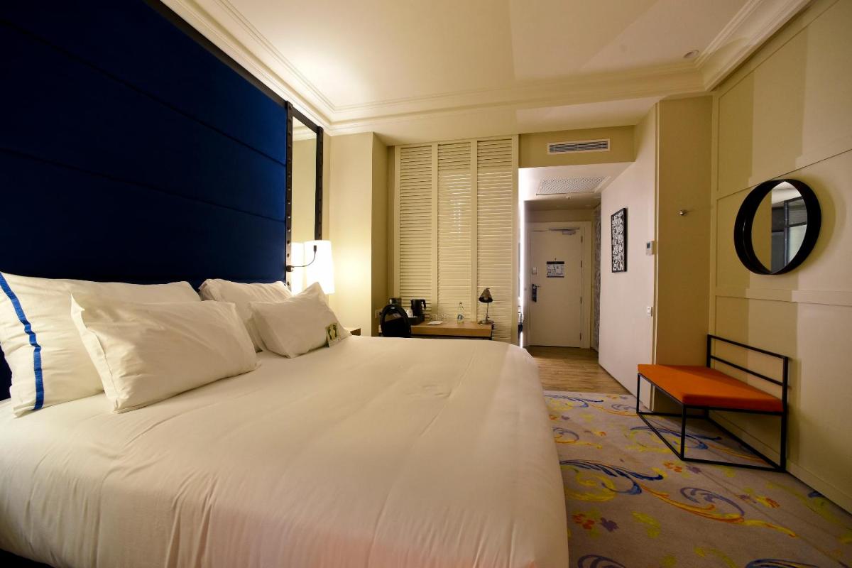Cama o camas de una habitación en Pestana Collection Plaza Mayor