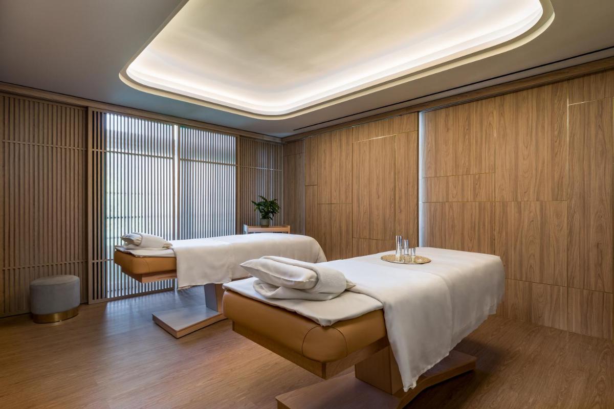Uma cama ou camas num quarto em Amoure Hotel - The Leading Hotels of the World