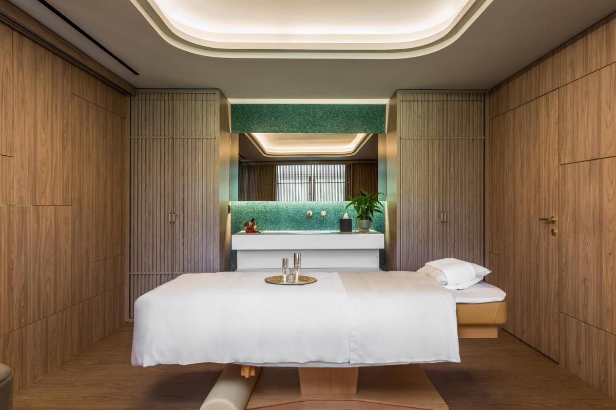 Uma cama ou camas num quarto em Amoure Hotel - The Leading Hotels of the World