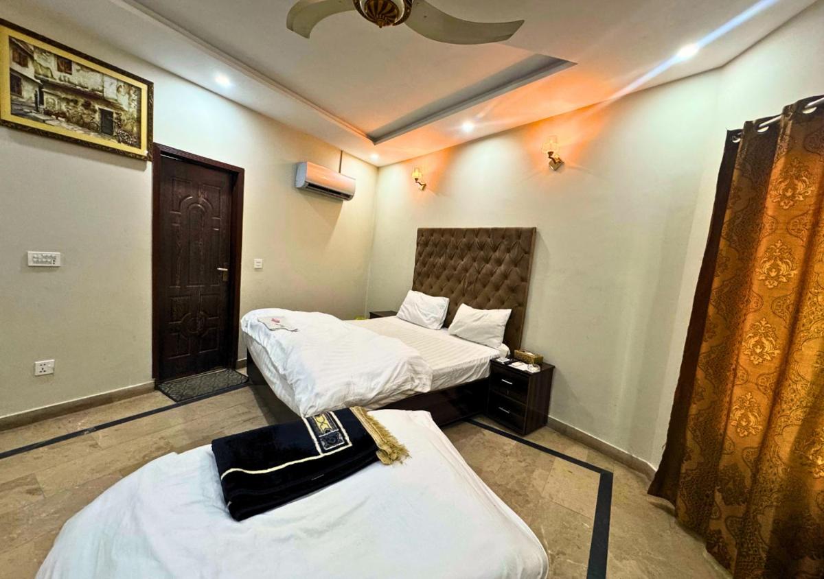 Dove inn Hotel near Shaukat Khanum Hospital - Hizvo