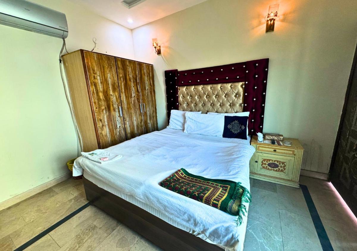Dove inn Hotel near Shaukat Khanum Hospital - Hizvo