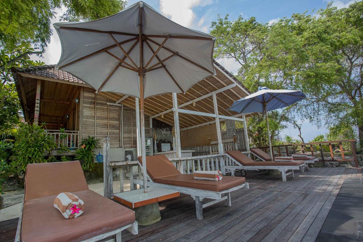 Wooden Beach Sunset Cottages - Housity