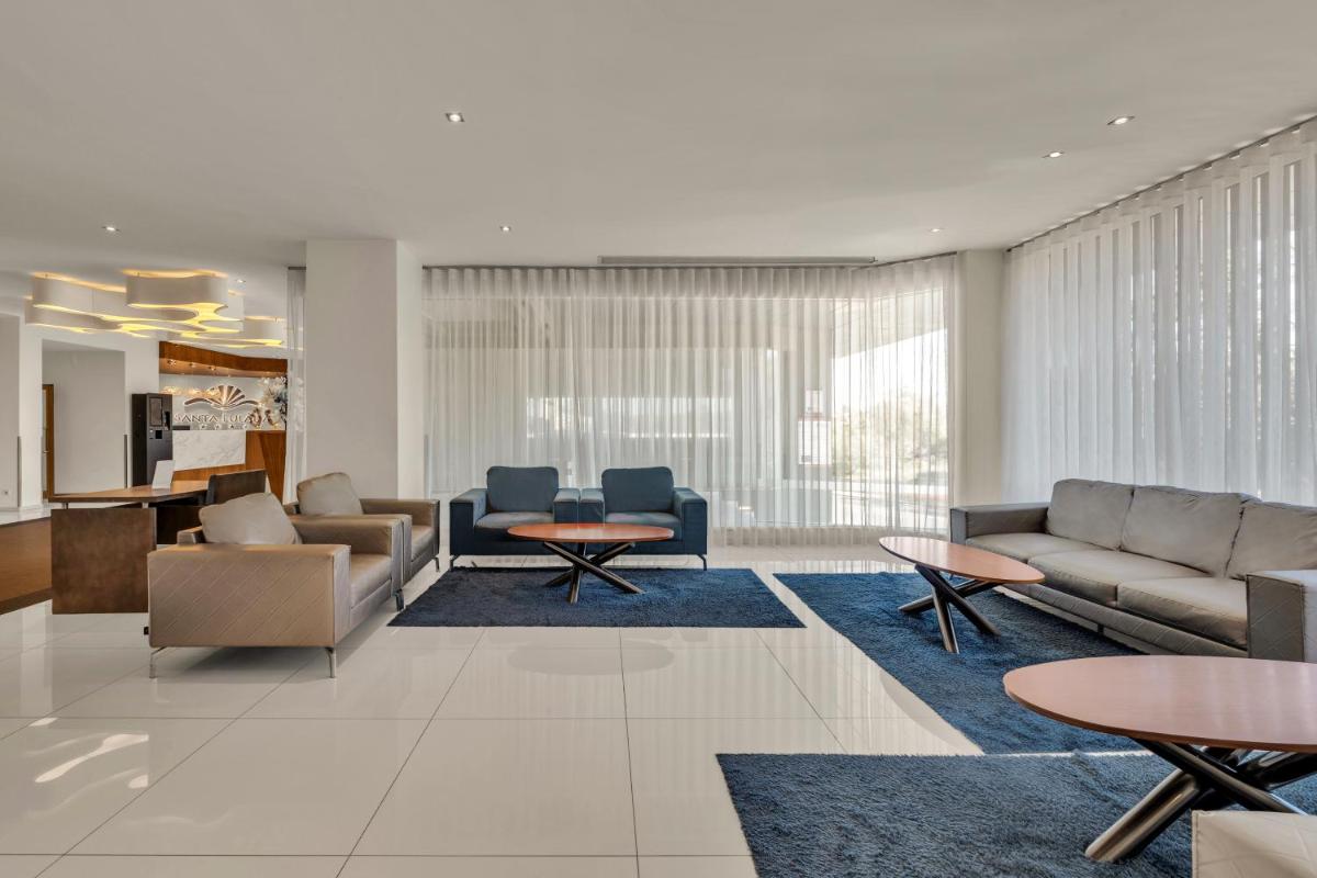 Uma área de estar em Santa Eulalia Hotel & Spa