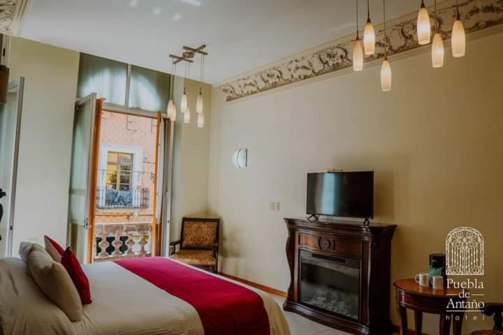 Hotel Puebla de Antaño - Housity