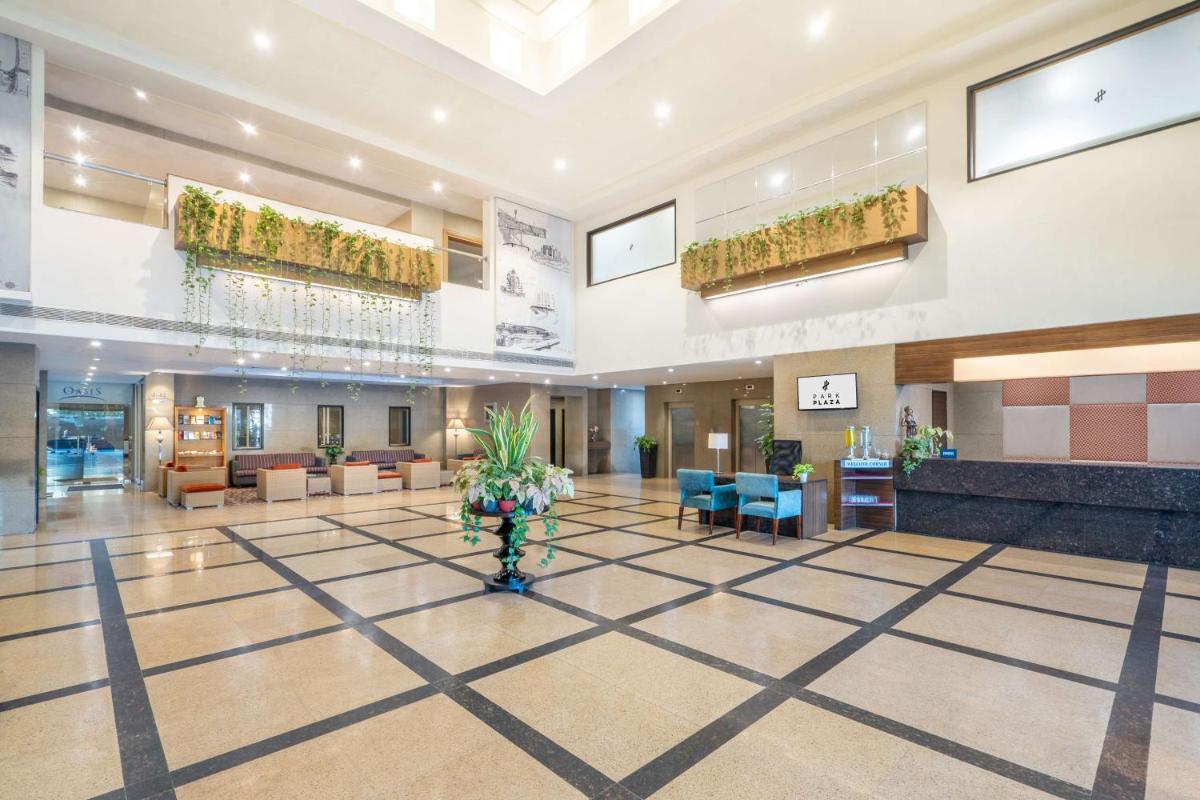 a lobby of a hospital with a waiting room at Park Plaza Chennai OMR in Chennai +55 photos