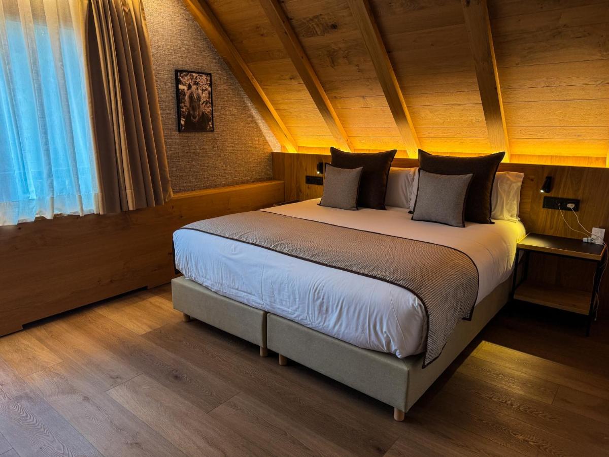 Cama o camas de una habitación en Hotel Petit Lacreu