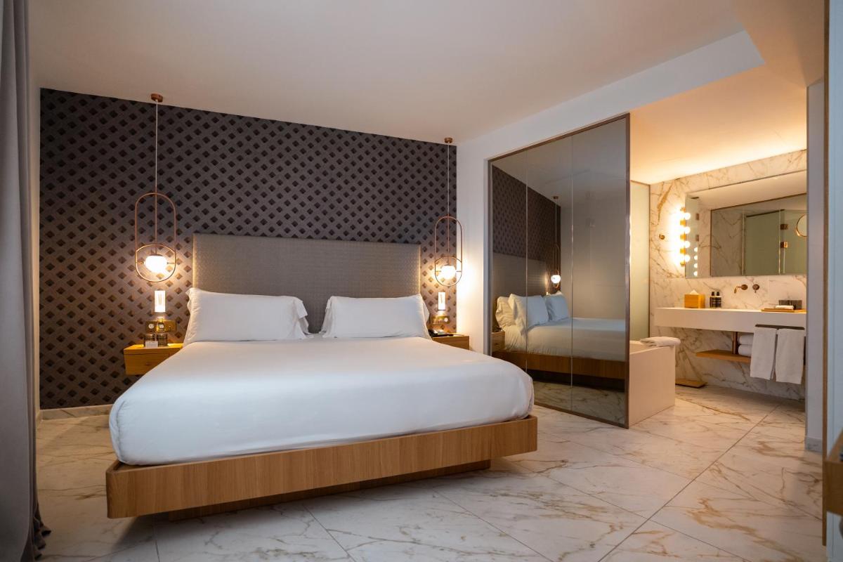 Cama o camas de una habitación en UMusic Hotel Madrid