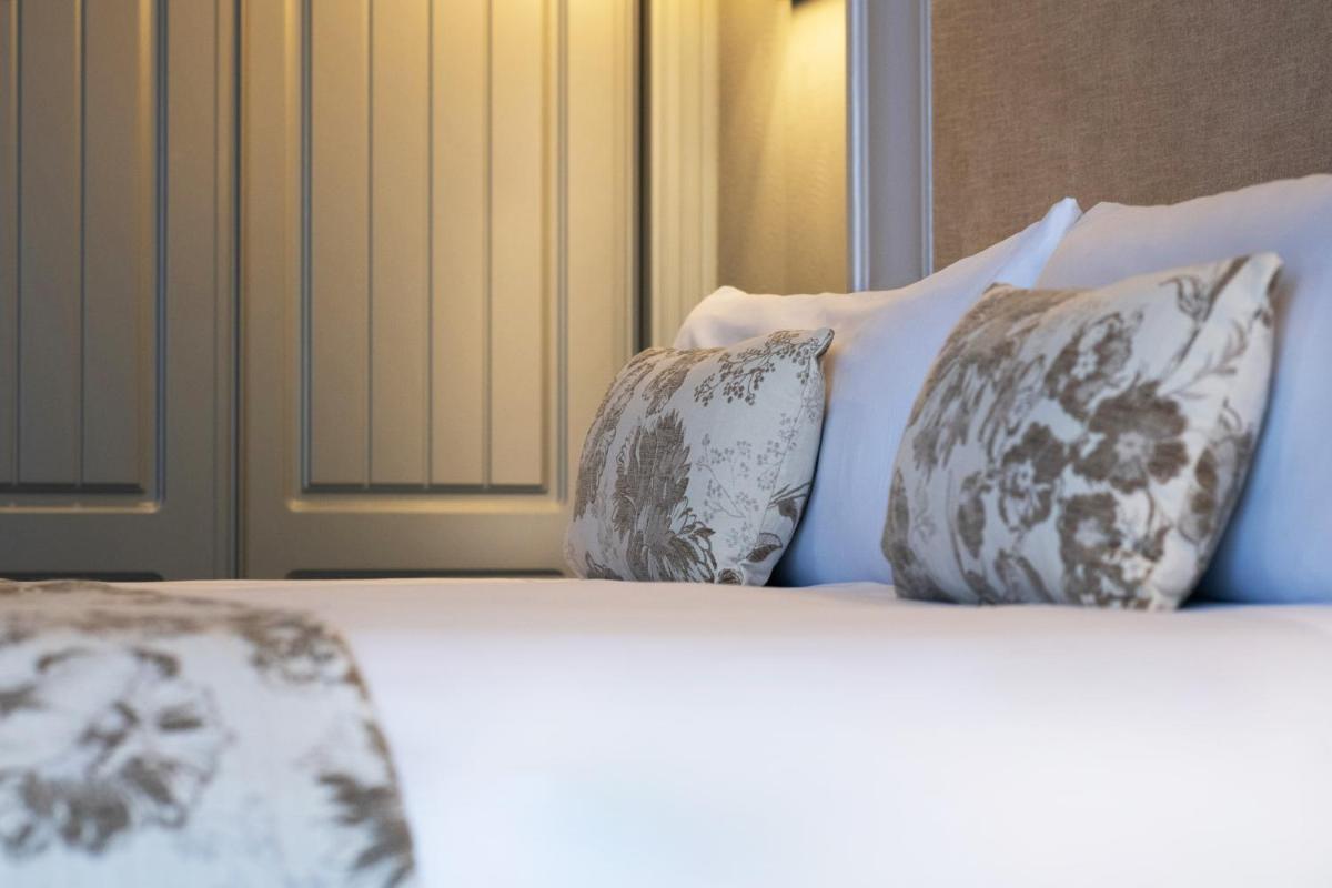 Cama o camas de una habitación en Hotel La Caminera Club de Campo