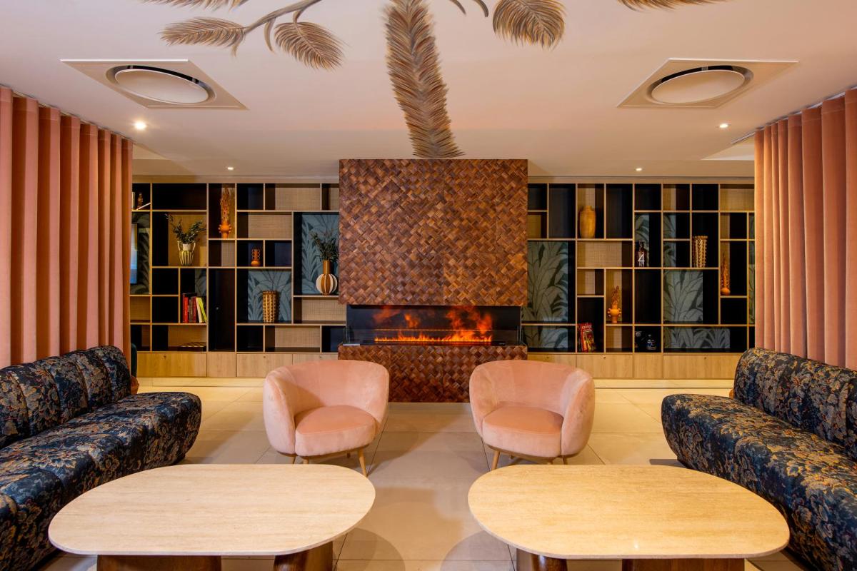 Coin salon dans l'établissement Golden Tulip Sophia Antipolis - Hotel & Spa