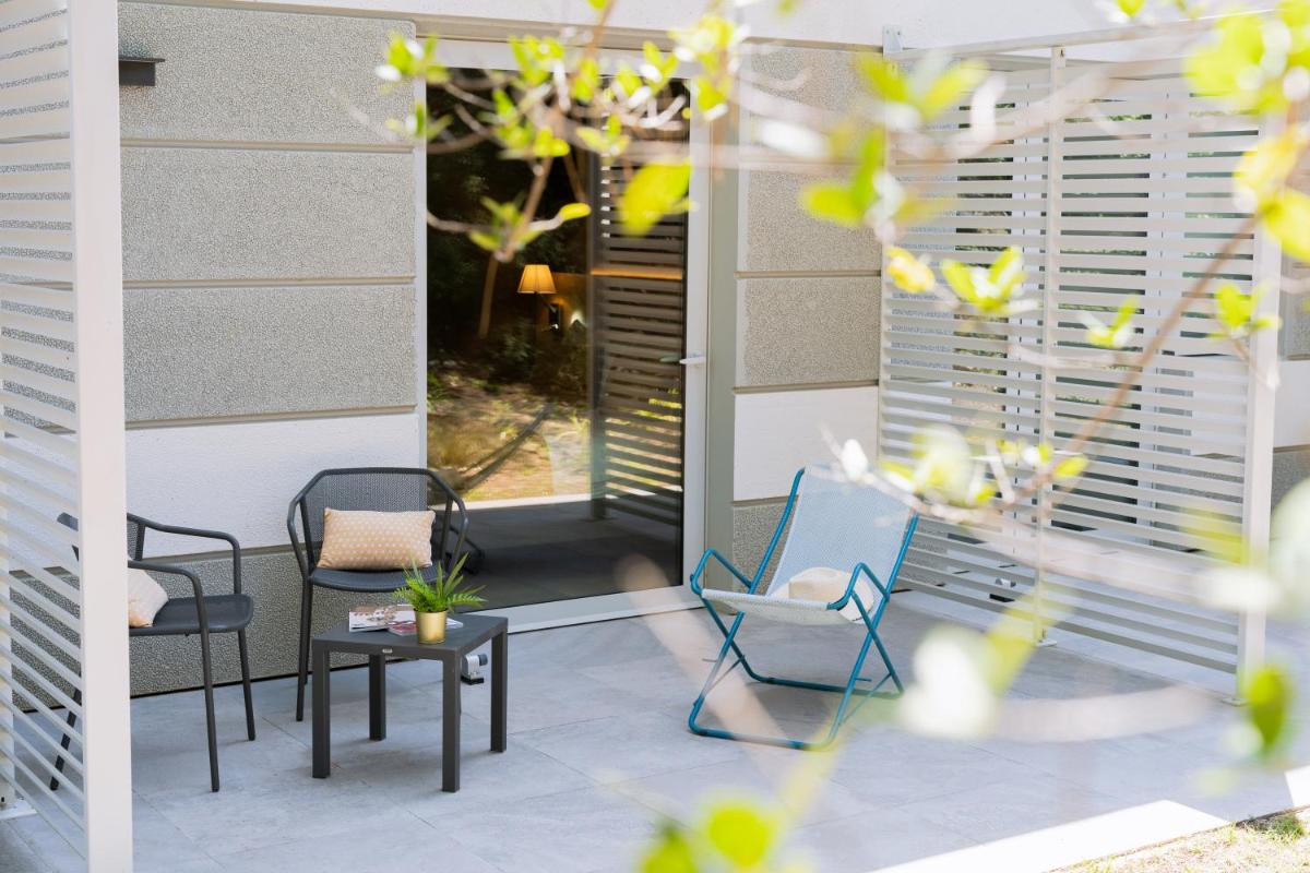 Coin salon dans l'établissement Golden Tulip Sophia Antipolis - Hotel & Spa