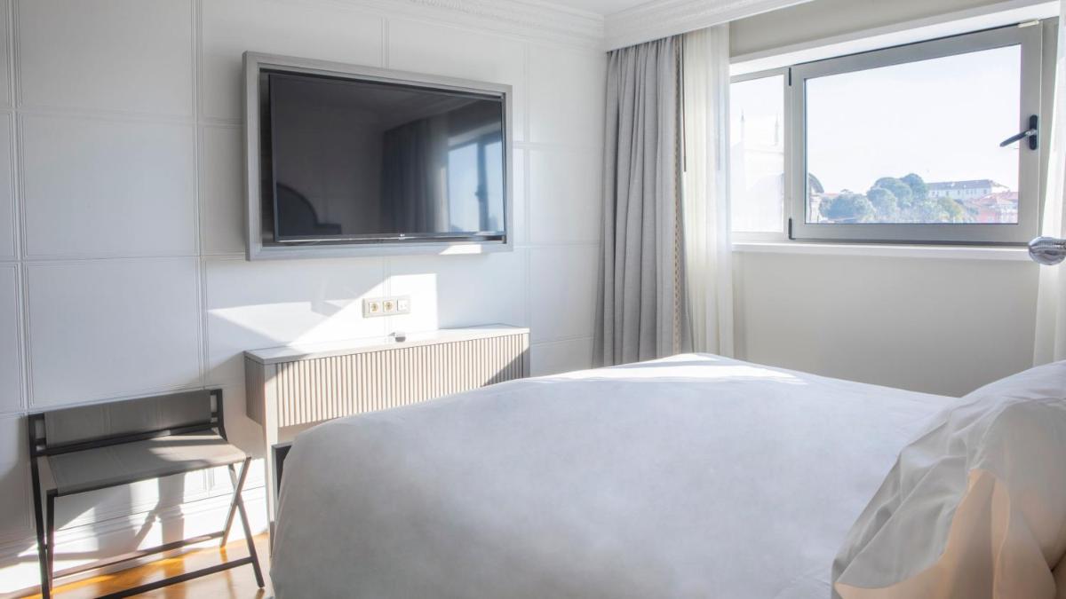 Uma cama ou camas num quarto em InterContinental Porto - Palacio das Cardosas by IHG