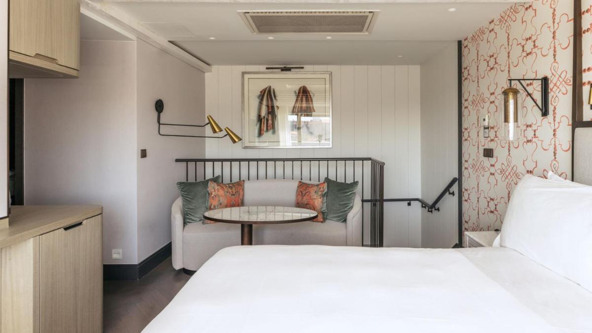 Uma cama ou camas num quarto em InterContinental Porto - Palacio das Cardosas by IHG